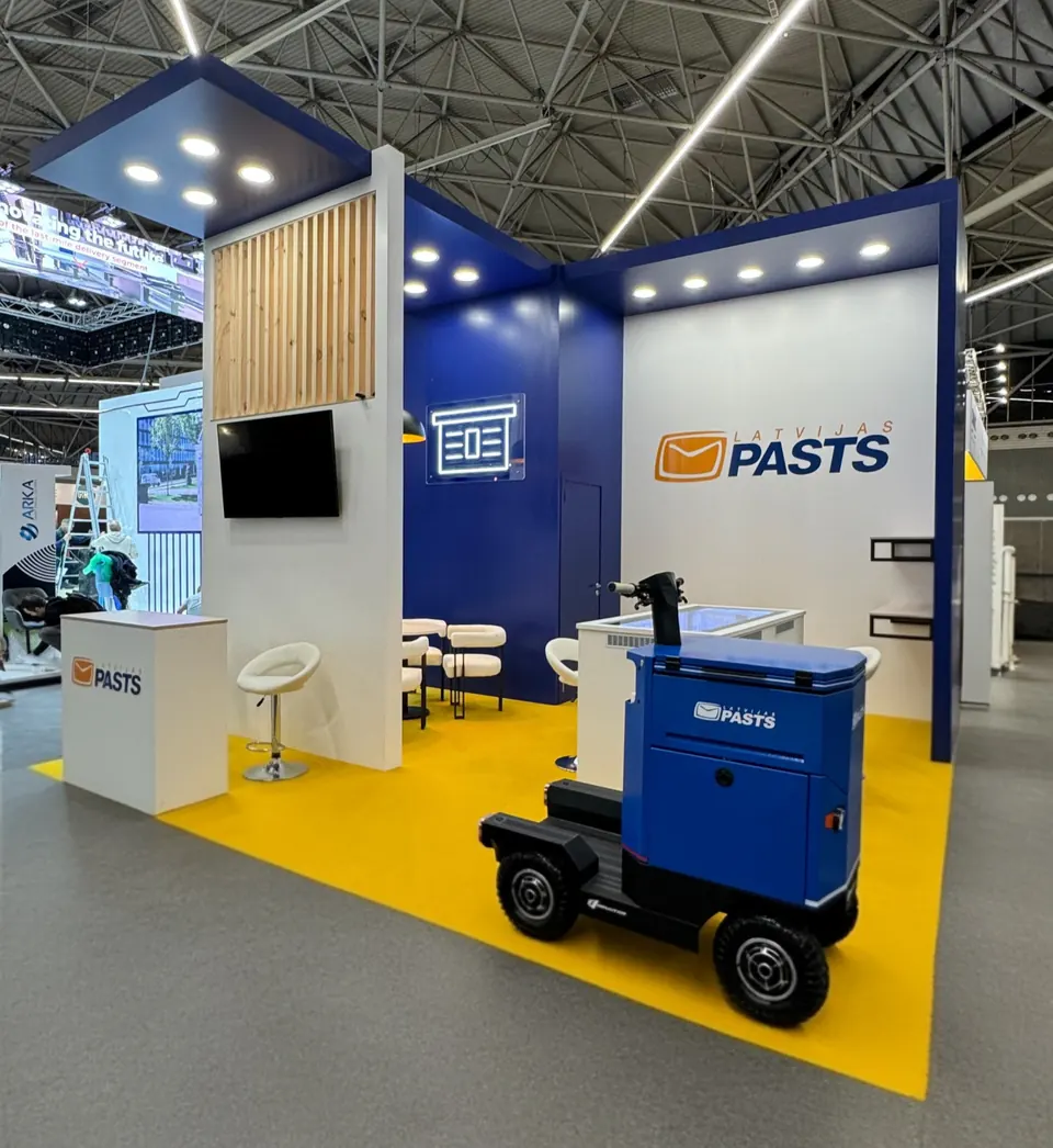 LATVIJAS PASTS stends izstādē PARCEL+POST EXPO, Nīderlande 2024. Izstāžu stenda dizains, ražošana un montāža, EVENT MORE